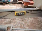 a picture of a yellow and black device in a room
