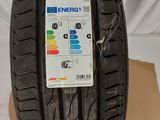 a close up of a tire on top of a cardboard box