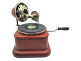 an old record player with a record on top of it