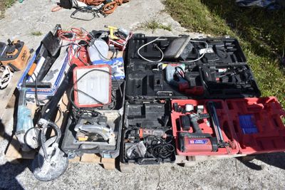 a lot of tools that are sitting on the ground