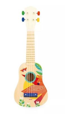 a wooden ukule with a bird design on it