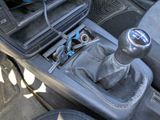 an image of a car interior with a gear shift