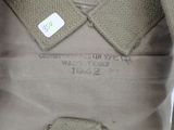 a close up of a jacket with a tag on it