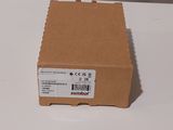 a brown box on a white table with a white background