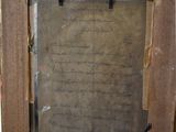 a picture of a wooden frame with writing on it