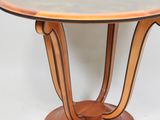 an image of a wooden table with a marble top on a pedestal