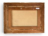 an old wooden picture frame with a piece of paper hanging on the wall