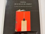 the cover of a book with a picture of a skyscraper in the background