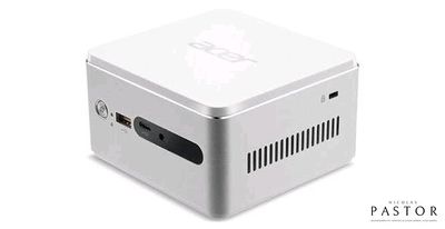 une image représentant un petit ordinateur blanc posé sur une surface blanche