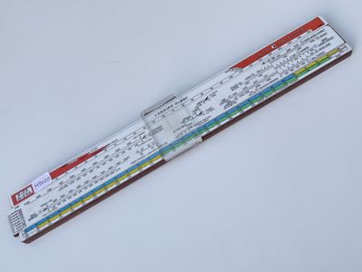 a close up of a ruler on a table with a white background