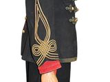 a man in a military uniform standing with his hands in his pockets