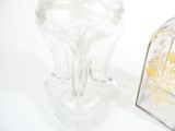 a clear glass vase and a clear glass box
