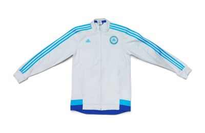a white jacket with blue stripes on the sleeves