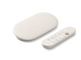 une télécommande posée à côté d'un objet blanc