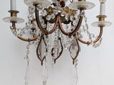 a chandelier hanging from the ceiling in a room
