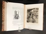 an open book with a picture of a man on it