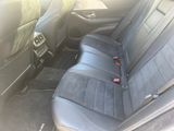 a black seat in the back of a car