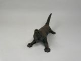 figurine of a cat on a white background