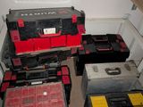 many tools sitting in the bottom of a drawer