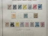 an old picture of a poster with a lot of stamps on it