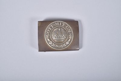 l'image d'une petite pièce d'argent sur laquelle figure une couronne