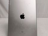 an apple ipad sitting on top of a table next to a white background