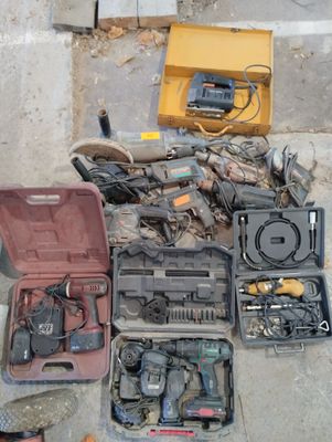 a lot of tools that are laying out on the ground