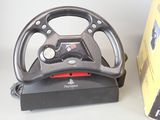 a steering wheel that is sitting on top of a box