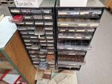 many bins of seeds and seeds on the floor