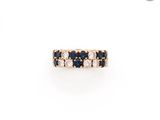 une bague en anneau sertie de saphirs et de diamants