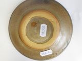 a brown bowl with a tag on it