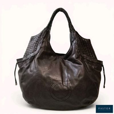 an image of a handbag with a smiley face on it