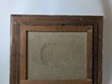 an old picture frame with a drawing of a bird on it