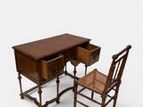 a desk with a chair next to it on a white background