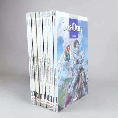 un lot de cinq livres pour enfants posé sur une surface blanche