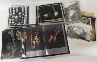 a lot of cd ' s sitting on a white surface