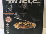 the box of a pizza is sitting on the table