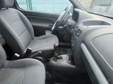 the interior of a car with black leather seats and a steering wheel