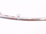 an image of a sword that is on a white surface