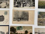 many old photos of people and animals on the wall