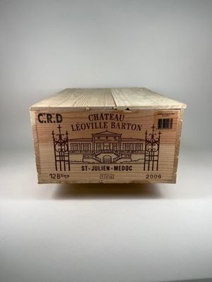 une boîte en bois sur laquelle est dessiné un bâtiment