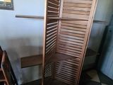 a room with a bunch of chairs and a table in it