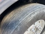 a close up of a tire on a truck