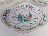 three plates that have different designs on them