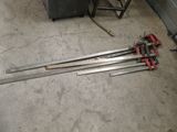 three tools that are laying on the floor