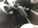 a close up of a car key in the center of a car