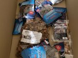 a box full of food that is sitting on the floor