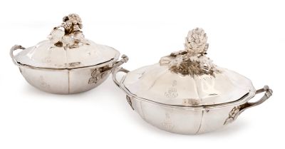 pair of silver plated dishes with handles and handles