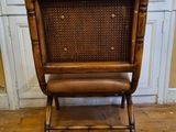 a chair that is sitting on a hard wood floor