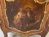 a picture of a painting on the side of a cabinet